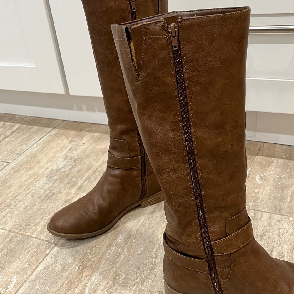 Tall brown Bass boots, made in USA. Barely worn except I cut only one elastic
